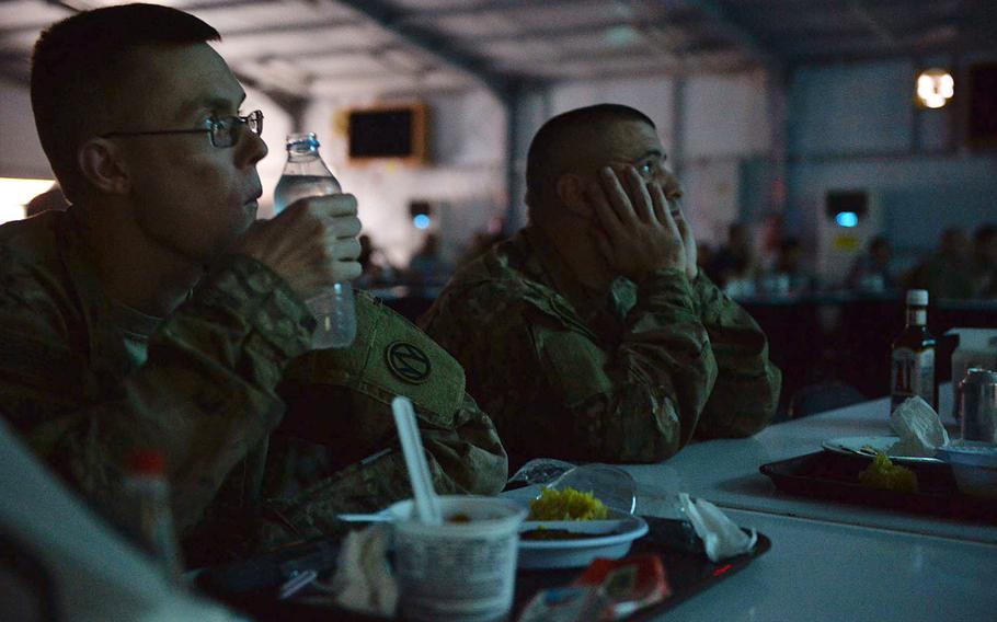 Staff Sgt. Jonathan Broyles, left, and Staff Sgt. Brandon Lund watch ''Rogue One: A Star Wars Story'' during a special screening for U.S. and coalition troops at Irbil International Airport in Iraq on  Jan. 6, 2017. Troops said the showing breaks up the monotony of life on deployment and gives them a chance to talk about something other than work with family back home.
