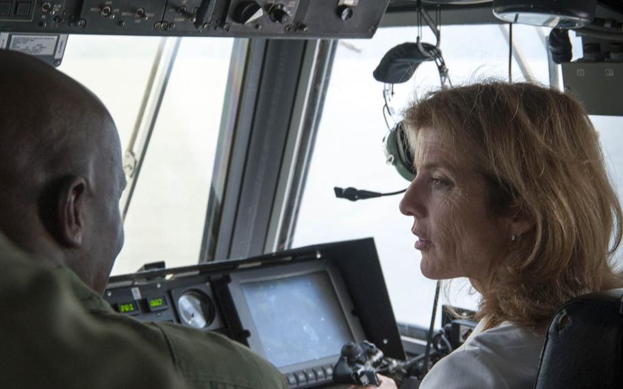 U.S. Ambassador to Japan Caroline Kennedy pilots Naval Beach Unit 7's Landing Craft, Air Cushion during an October visit to Sasebo, Japan.