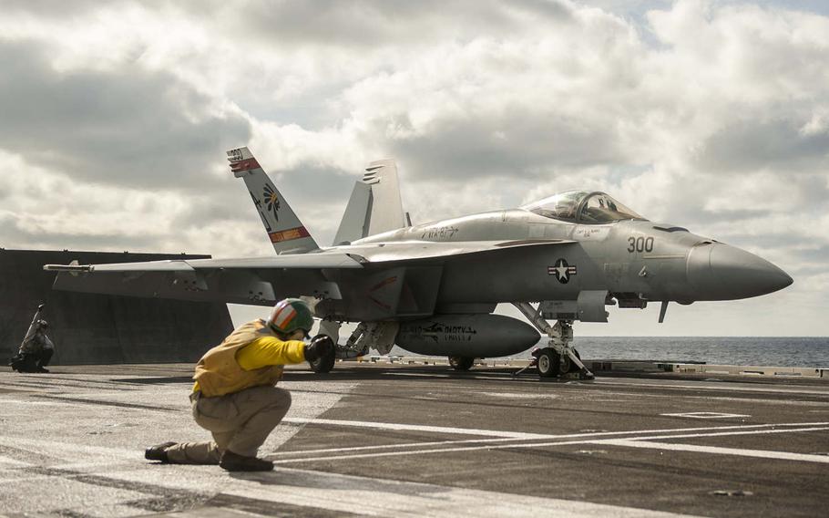 An F/A-18E Super Hornet attached to the "Golden Warriors" of Strike Fighter Squadron 87 prepares to launch from the flight deck of the aircraft carrier USS George H.W. Bush, Dec. 3, 2016. Bush deployed on Saturday, Jan. 21, 2017, to the 5th and 6th fleet areas of operations to support the air campaign against the Islamic State group.