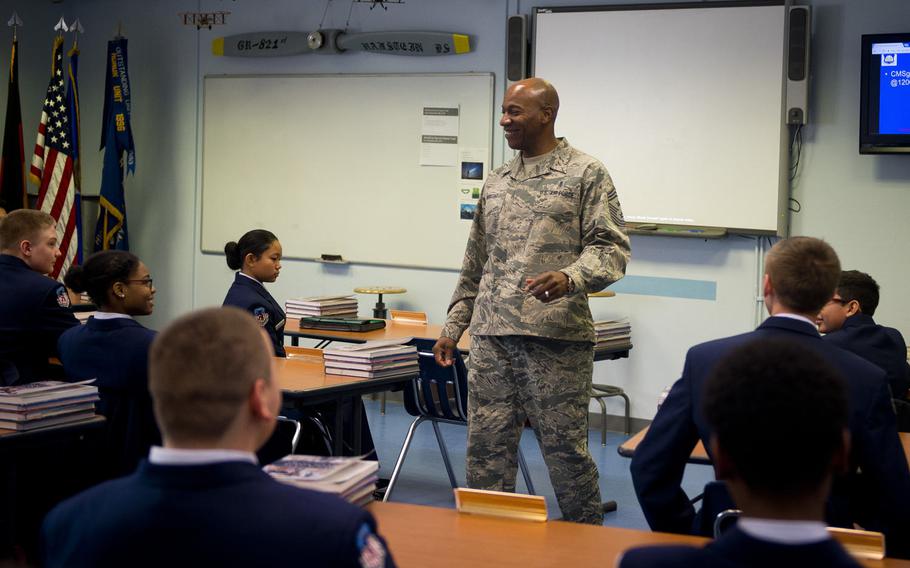 Chief Master Sgt. Kaleth Wright, U.S. Air Forces in Europe and Africa command chief master sergeant, speaks with Ramstein High School Air Force Junior Reserve Officer Training cadets at Ramstein Air Base, Germany, on Monday, Jan. 23, 2017.