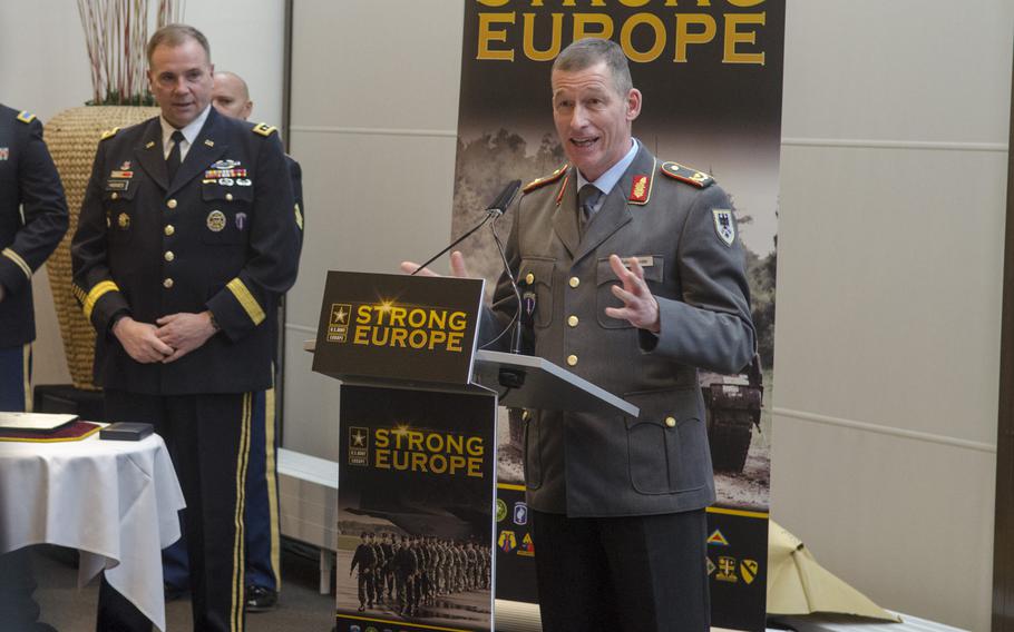 German Army Brig. Gen. Kai Rohrschneider, right, speaks during a ceremony welcoming him as the new U.S. Army Europe chief of staff, Thursday, Jan. 26, 2017, at Clay Kaserne in Wiesbaden. Rohrschneider, will be the second German to serve in that role, succeeding Brig. Gen. Markus Laubenthal.