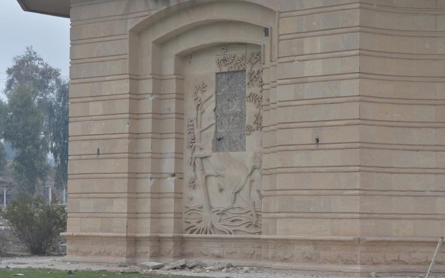 This photograph shows the damage done by the Islamic State group to a palace overlooking the Tigris River in Mosul, Iraq.