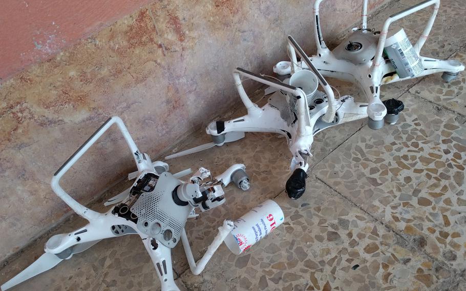 Pictured is a quadcopter modified by the Islamic State group to drop 40 mm rifle grenades. The devices were downed by the Iraqi Counter Terrorism Service in Mosul, Iraq. Insurgent groups in Iraq are ahead of militants in Afghanistan in their use of handheld drones. Many of them now use the devices for surveillance, targeting and armed attacks.