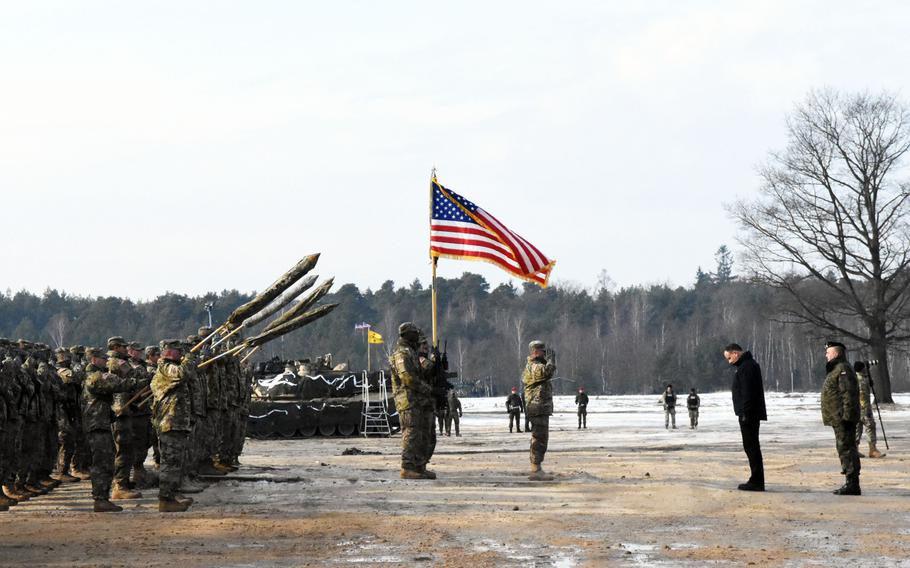 Poland's President Andrzej Duda pays his respects to the U.S. Army during the live fire exercise between the two nations, on Monday, Jan. 30, 2017.