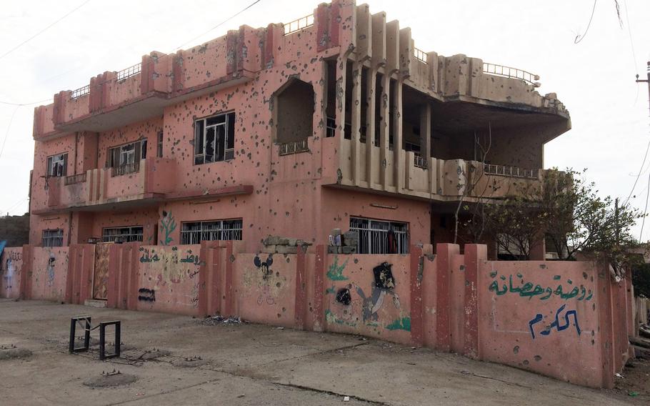 A bullet-riddled schoolhouse in Mosul, Iraq, Monday, Jan. 30, 2017.