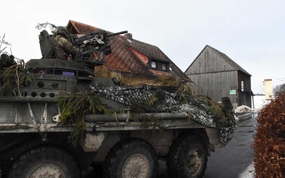 A Stryker rolls through a German village during an Army training exercise, Thursday, Feb. 2, 2017.