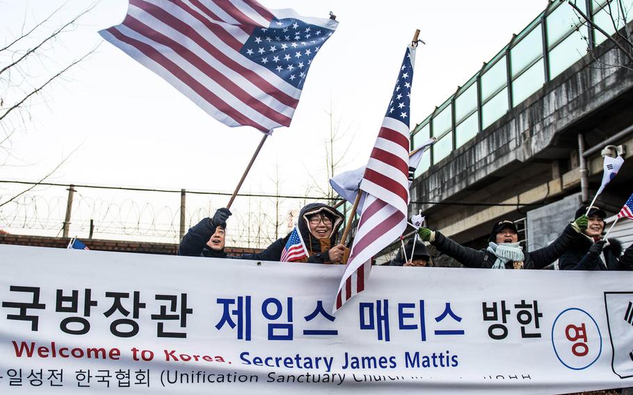 Members of the Unification Sanctuary Church of Korea welcome Secretary of Defense Jim Mattis on his first visit as Pentagon chief to Seoul, South Korea, Friday, Feb. 3 2017.