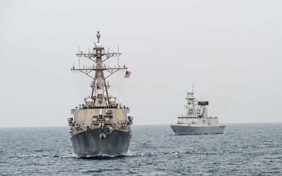 France's FS Forbin sails into position behind U.S. Navy guided-missile destroyer USS Mahan while sailing in formation during exercise Unified Trident in the Persian Gulf, Wednesday, Feb. 1, 2017.  