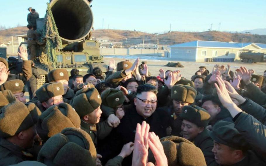 North Korean leader Kim Jong Un is shown in photos purportedly observing the launch of an intermediate-range missile over the weekend. The ruling Workers' Party's newspaper, Rodong Sinmun, did not provide details about the photos, but they were published with a front-page article describing the missile test as a success.