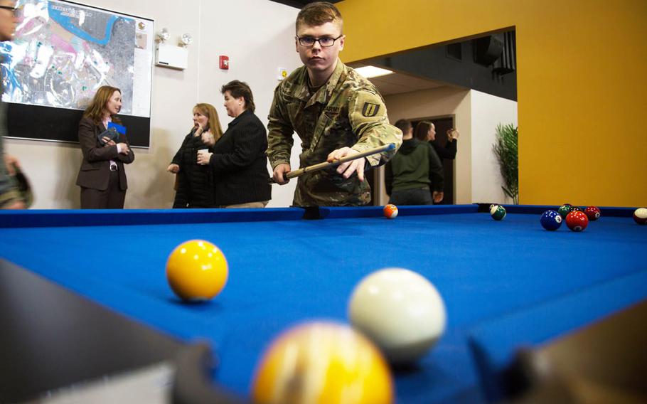 People play pool and explore the new Warrior Zone entertainment complex at Camp Humphreys, South Korea, Thursday, Feb. 16, 2017.