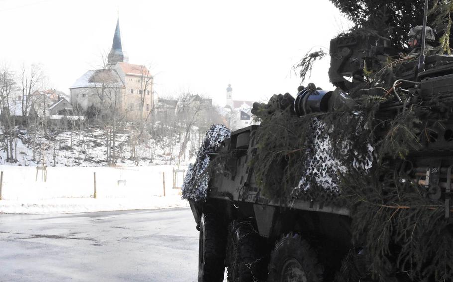 Army scouts with the 2nd Cavalry Regiment pull up to a German village during training on Feb. 2, 2017. The regiment will be deploying to Poland in April as part of NATO's Enhanced Forward Presence initiative.