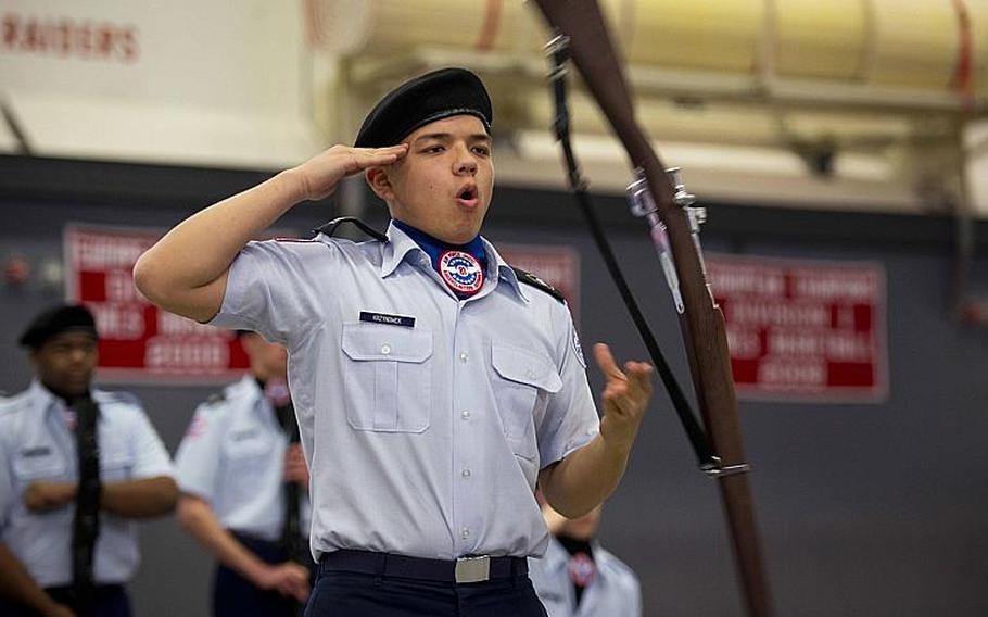 Kaiserslautern's Anthonee Krzynowek performs in the armed team rifle exhibition during the DODEA-Europe JROTC drill team championships in Kaiserslautern, Germany, on Saturday, March 4, 2017.

Michael B. Keller/Stars and Stripes