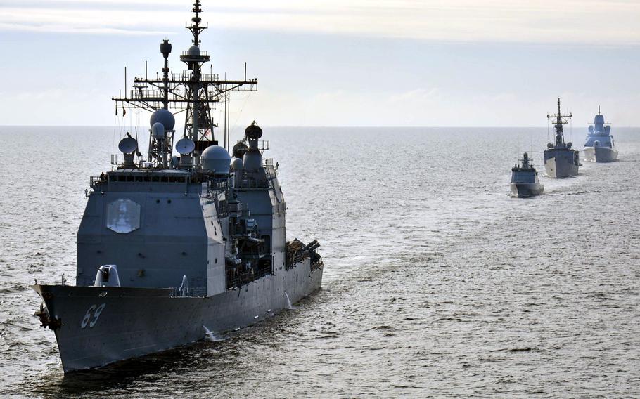 From left, Standing NATO Maritime Group 2 ships USS Vicksburg , Lithuanian frigate LNS Aukstaitis, Turkish ship TCG Goksu and  Dutch ship HNLMS Tromp participate in ship maneuvering drills during a passing exercise in the Baltic Sea in 2015.