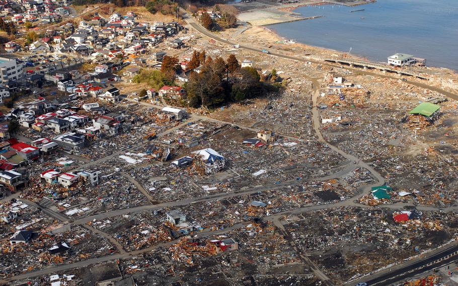 An aerial view of damage to Sukuiso, Japan, a week after a 9.0-magnitude earthquake and subsequent tsunami devastated the area.