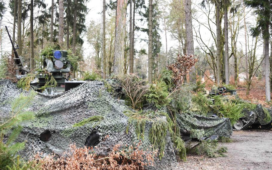 Various camouflaged artillery observation vehicles from participating NATO nations during Exercise Dynamic Front on Wednesday, March 8, 2017.