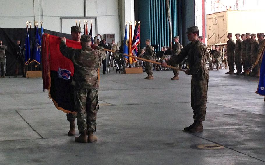 Commanders and soldiers of the 10th Combat Aviation Brigade uncase their unit colors, symbolizing their arrival in Europe, in a ceremony at Storck Barracks in Illesheim, Germany, Thursday, March 9, 2017. The 10th CAB, of Fort Drum, N.Y., is the Army's first rotational aviation brigade in Europe.