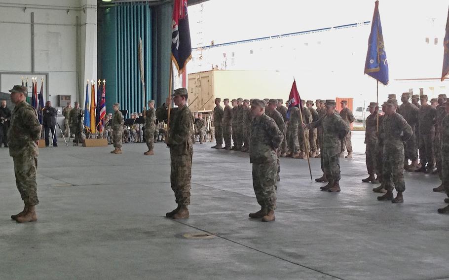 Commanders and soldiers of the 10th Combat Aviation Brigade uncase their unit colors, symbolizing their arrival in Europe, in a ceremony at Storck Barracks in Illesheim, Germany, Thursday, March 9, 2017. The 10th CAB, of Fort Drum, N.Y., is the Army's first rotational aviation brigade in Europe.