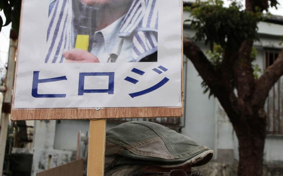 People gather daily in front of Naha District Court in Okinawa, Japan, to protest the detention of anti-U.S. base protest leader Hiroji Yamashiro, who has been held in solitary confinement without bail since October.