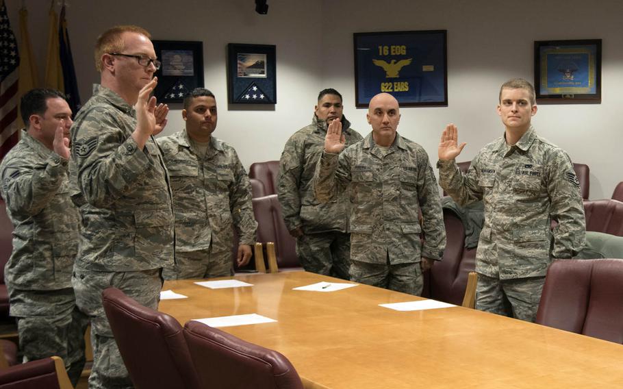 Several 108th Wing airmen re-enlist at Joint Base McGuire-Dix-Lakehurst, N.J., March 11, 2017.