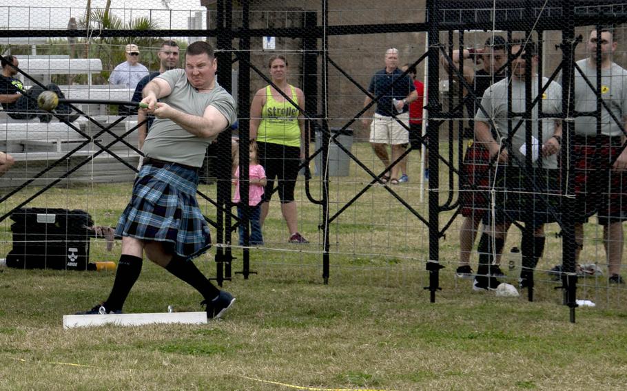 A man competes in the hammer throw during in the Torii Station Highland Games in Okinawa, Japan, Saturday, March 18, 2017.
