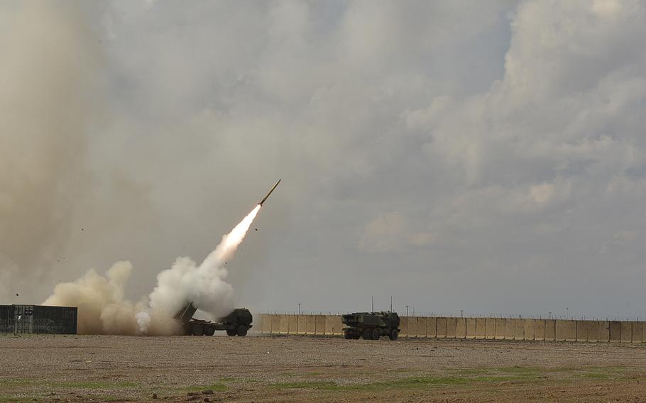Known as the ''70-kilometer sniper,'' a M31 Guided Multiple Launch Rocket System unitary rocket, or GMLRS, is pictured here being launched from Qayara Airfield West, Iraq, toward Islamic State targets about 40 miles away in Mosul, March 17, 2017.