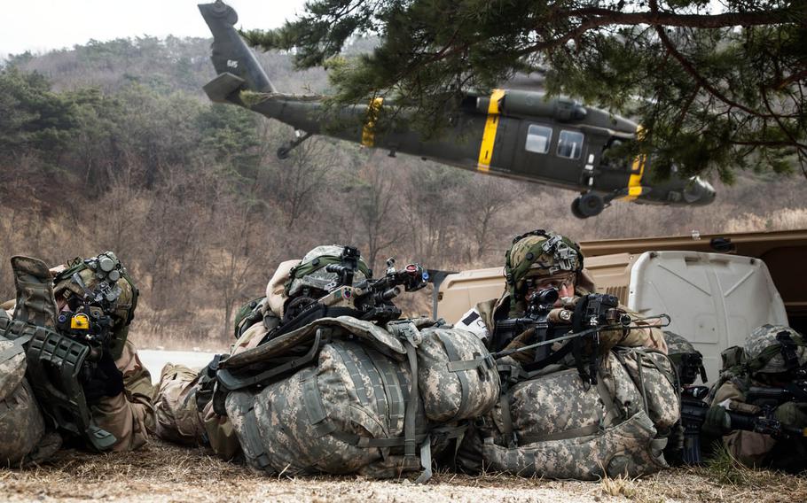 Soldiers from the 1st Armored Brigade Combat Team, 1st Infantry Division protect a landing zone during training at Rodriguez Live Fire Range in Paju, South Korea, Tuesday, March 21, 2017.