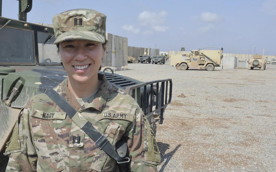 Capt. Anne Nagy, battalion planner with the 37th Brigade Engineer Battalion of the 82nd Airborne Division's 2nd Brigade Combat Team, is pictured here, March 17, 2017, on Qayara Airfield West. Nagy, whose job is to plan the ongoing build-out of the base, said her job is like the city-building computer game ''SimCity.''