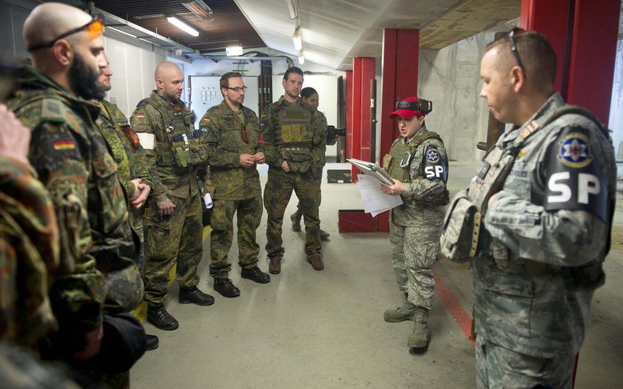Tech Sgt. Kellie Sawn, second from right, gives safety instructions to German soldiers in Kaiserslautern, Germany, on Thursday, March 23, 2017.