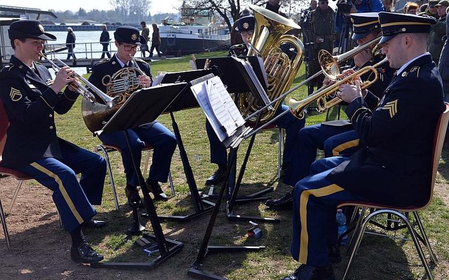 The U.S. Army Europe brass quintet entertained with World War II-era music, besides playing the German and American national anthems at the Rhine River crossing monument in Nierstein, Germany, Saturday, March 25, 2017.