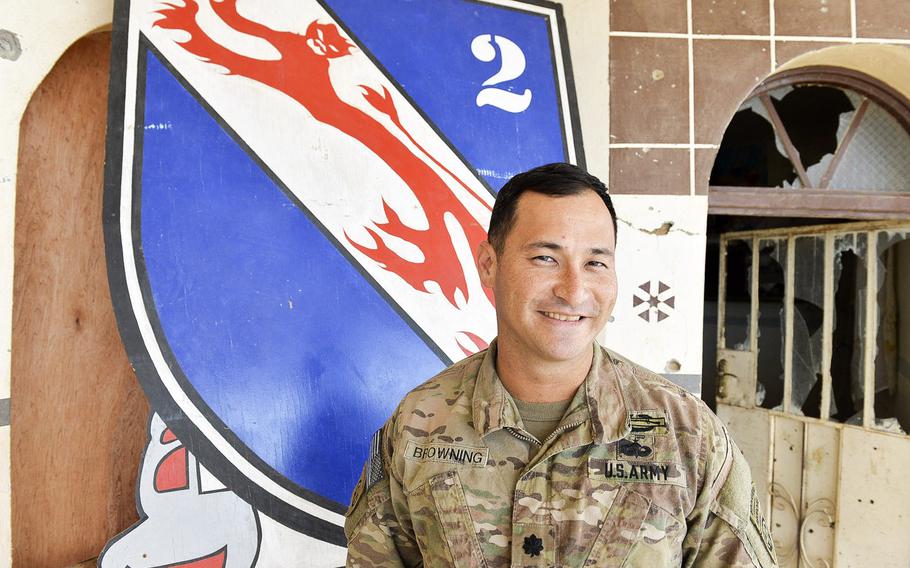Lt. Col. James Browning, commander of 2nd Battalion, 508th Parachute Infantry Regiment, 2nd Brigade Combat Team, 82nd Airborne Division, is pictured here on March 2, 2017, in front of the regimental coat of arms at a tactical base south of Mosul, Iraq, where his unit is advising Iraqi forces in the battle for Mosul.