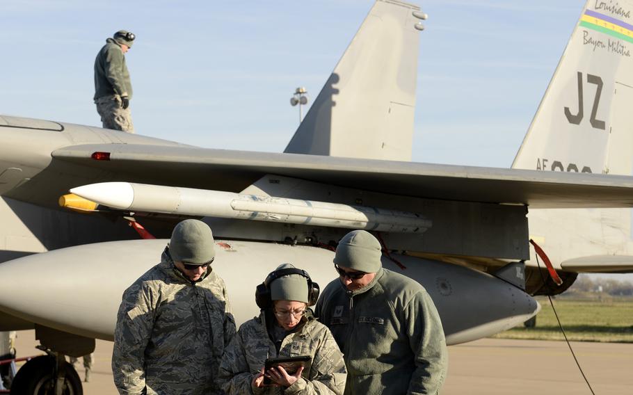 Airmen from the 122nd Expeditionary Fighter Squadron perform maintenance at Leeuwarden Air Base, Netherlands, March 24, 2017. F-15C's from the Lousiana and Florida Air National Guard's 159th EFS deployed to Europe to participate in a Theater Security Package. These F-15s will conduct training alongside NATO allies to strengthen interoperability and to demonstrate U.S. commitment to the security and stability of Europe.