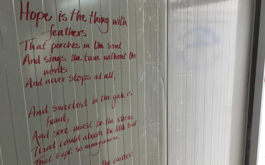 The Emily Dickinson poem ''Hope is the Thing with Feathers'' is written on the wall of the trailer that serves as a cafeteria at a Samaritan's Purse field hospital east of Mosul, where roughly 1,000 patients have been treated since the facility opened in January to treat casualties of the military campaign against the Islamic State in that city. The wall is pictured here on March 13, 2017.