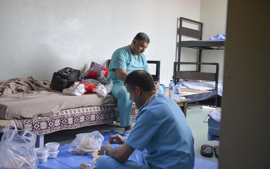 Staff of the operating room at the West Irbil Emergency Hospital in Iraq take a lunch break, March 11, 2017. New facilities and groups treating the wounded from the fight for Mosul, about 50 miles west of Irbil, are relieving some of the strain at the emergency hospital, which was built by the U.S. Army Corps of Engineers.