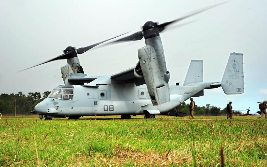 Marines disembark from an MV-22 Osprey after landing at Camp Rocky in Rockhampton, Queensland, during the buildup to the Talisman Saber exercise in 2013.