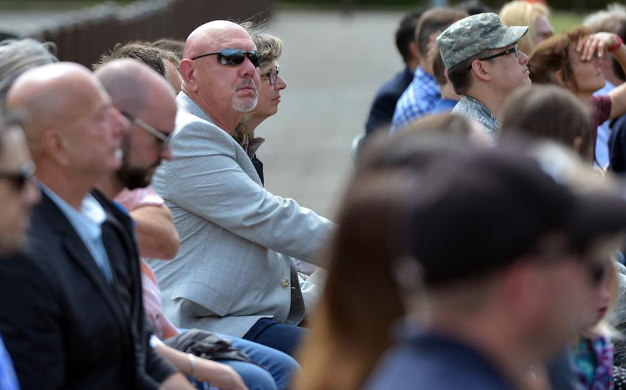 Bitburg High School alumnus Robert Frost, center with sunglasses, listens to speeches at the school's closing ceremony, Thursday, June 8, 2017. Frost attended Bitburg High from 1961 to '63. He was visiting German friends in Bitburg who surprised him by taking him to the ceremony.