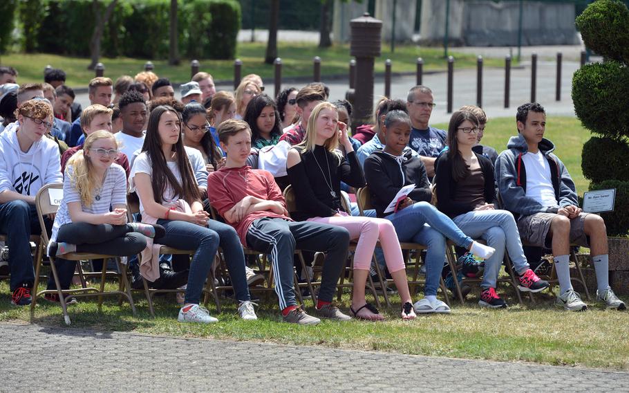 Bitburg High School students listen to speeches during their school's closing ceremony Thursday, June 8, 2017. The school is closing after 60 years. The students will go to the newly established Spangdahlem High School next school year.