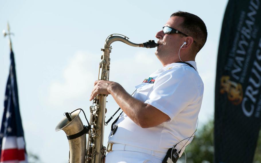 Musician 1st Class Manuel Pelayo de Gongora performs with the U.S. Navy Band Cruisers at Cowan Creek Amphitheater in Georgetown, Texas, Aug. 9, 2017.