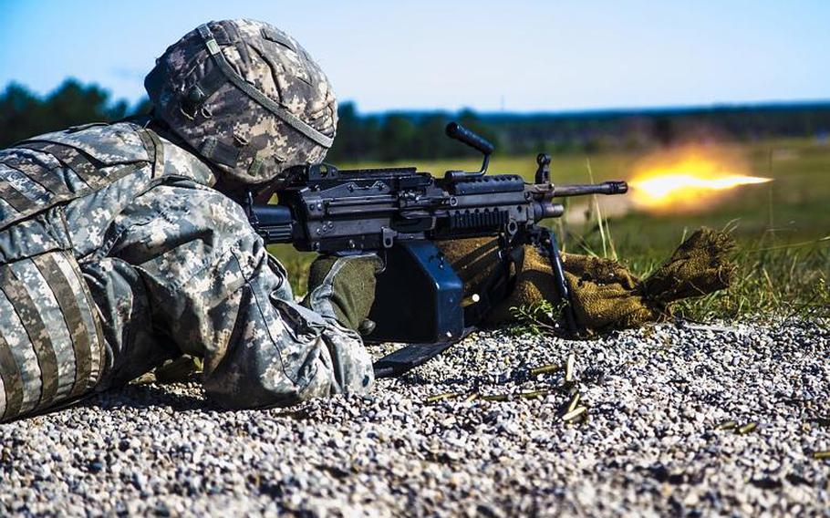A Michigan National Guard soldier fires the M249 Squad Automatic Weapon during an exercise in Northern Michigan on Aug. 7, 2017. The Army wants a next-generation system that would replace the M249 and other weapons.
