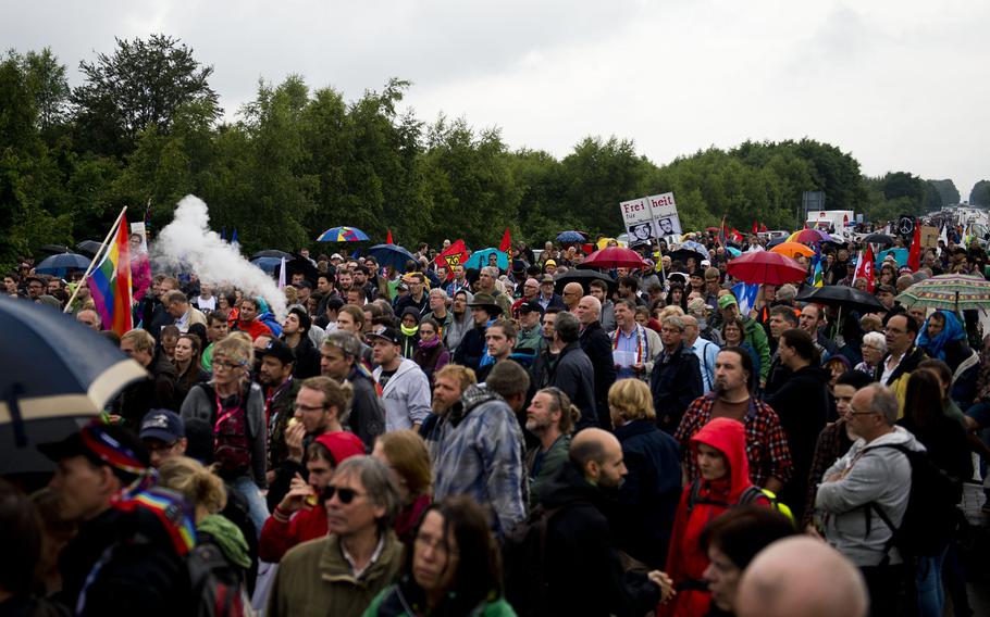 Several thousand protesters listen to a speaker outside Ramstein Air Base, Germany, on June 11, 2016. The organization Stopp Air  Base Ramstein, which aims to halt alleged drone operations at the base, plans to hold a protest in September.