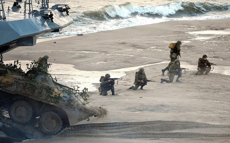 Troops come ashore during the Zapad Russian-Belarusian exercises at the Khmelyovka test ground, Russia, in September 2013.