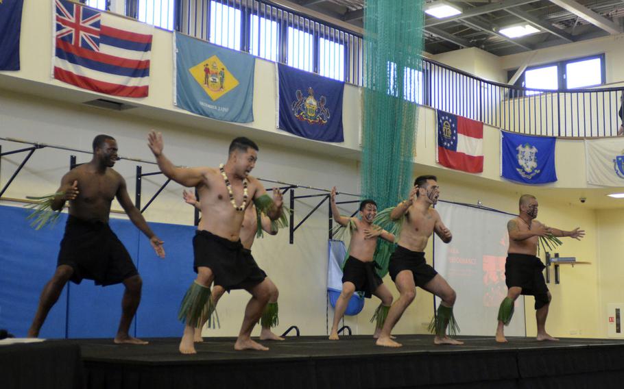 Airmen perform a traditional Maori haka war dance during the second annual Diversity and Inclusion Day at RAF Mildenhall, England, on Aug. 18, 2017.