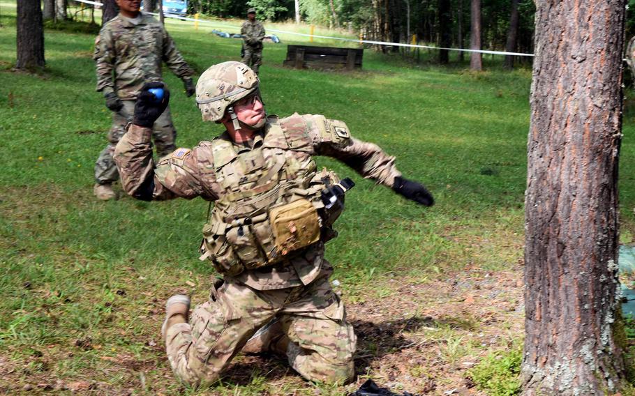 Lt. Maclean Lalor, a soldier with the 173rd Brigade Combat Team, throws a practice grenade during the U.S. Army Europe Best Warrior Challenge, Aug. 22, 2017, at Grafenwoehr, Germany. 

Martin Egnash/Stars and Stripes