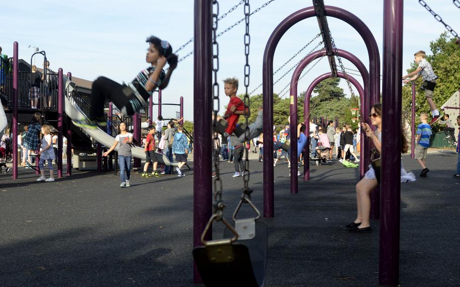 Lakenheath Elementary School students taking advantage of the playground before the first day of school at RAF Lakenheath, England, Monday, Aug. 28, 2017.