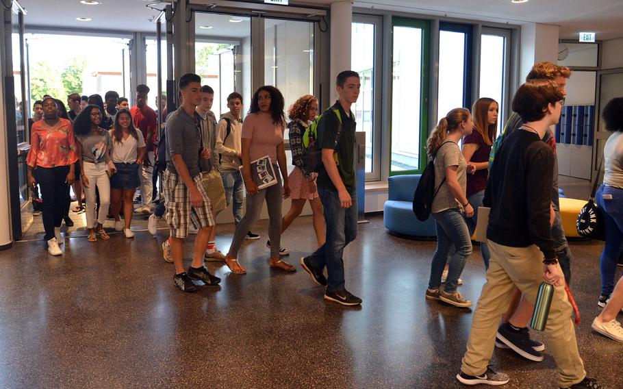 Wiesbaden High School students enter their new school for the first day of the 2017-18 school year, Monday, Aug. 28, 2017. Five hundred students were enrolled on the first day of classes in the first 21st-century-designed school in the Department of Defense Education Activity.