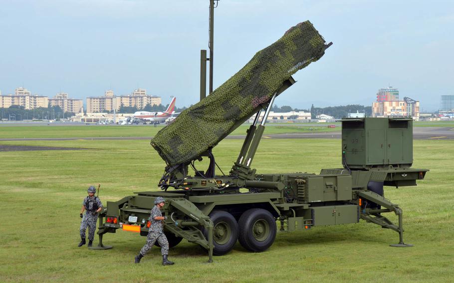 Japan Air Self-Defense Force troops set up a Patriot missile-defense system at Yokota Air Base, Japan, Tuesday, Aug. 29, 2017.