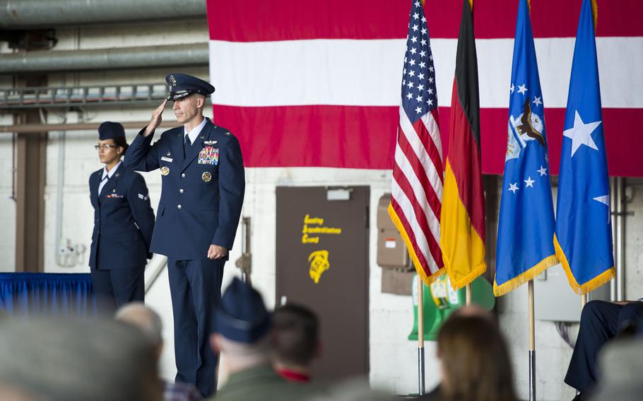 Col. Jason Bailey, 52nd Fighter Wing commander, receives his first salute from the wing during the unit's change-of-command ceremony at Spangdahlem Air Base, Germany on Tuesday, Aug. 29, 2017.