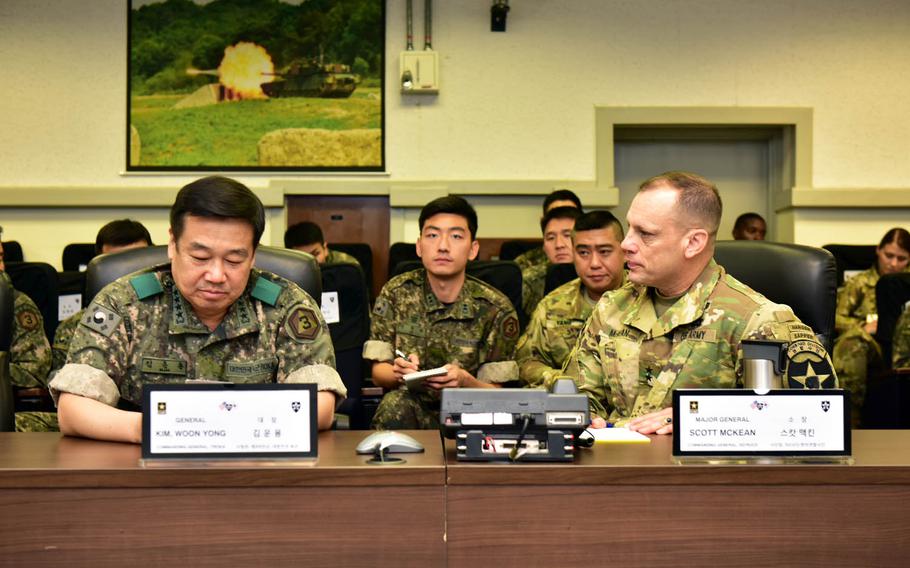 Third Republic of Korea Army commander Gen. Woon-Yong Kim meets with 2nd Infantry Division commander Maj. Gen. Scott McKean and other members of the combined U.S.-South Korean division to discuss lessons learned during annual joint war games known as Ulchi Freedom Guardian, at Camp Red Cloud, South Korea, Wednesday, Aug. 30, 2017.