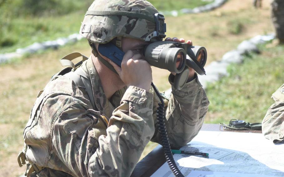 Spc. Kaden Voss is graded on calling for artillery fire during the Expert Infantry Badge certification at Hohenfels, Germany, on Wednesday, Aug. 30, 2017.