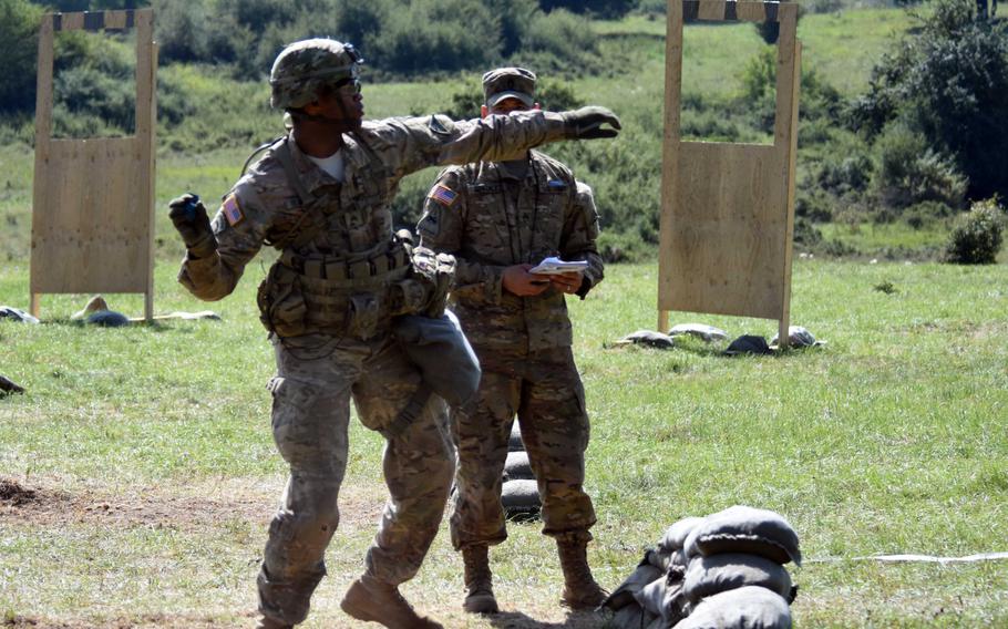 Sgt. Mark Blackwell throws a practice grenade during the Expert Infantry Badge certification at Hohenfels, Germany, on Wednesday, Aug. 30, 2017.