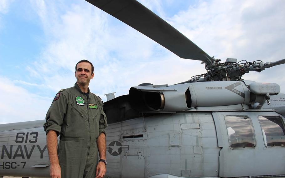 Navy pilot Lt. Cmdr. Pat Dunn talks about relief efforts during Huricane Harvey. Dunn is a part of the  Dusty Dogs of the Helicopter Sea Combat Squadron, based of out Norfolk, VA, who assisted in the rescue mission.